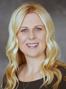 professional portrait of blonde woman with necklace
